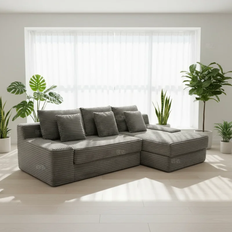Jerry’s grey channel-tufted sectional sofa